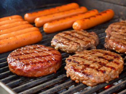 hamburgers-and-hot-dogs-grilling-on-a-barbecue-grill-free-photo